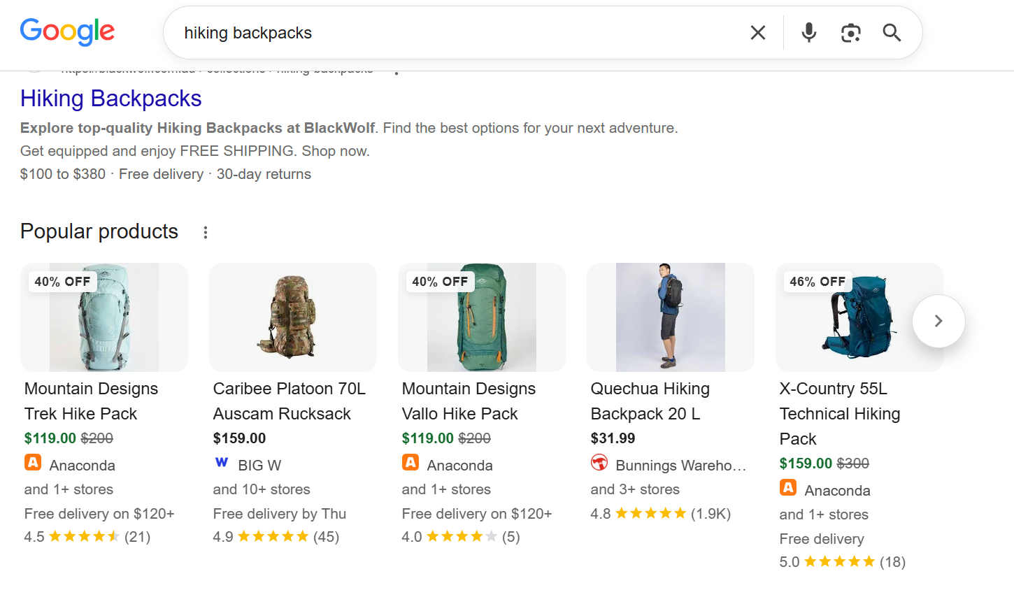 An Australian outdoor store's 'Hiking Backpacks' collection page ranking in Google with an optimised title and meta description, above the Popular products results